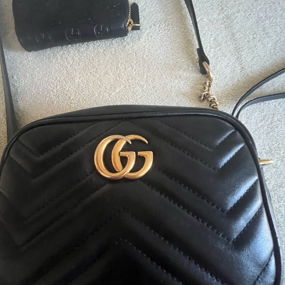 Black Gucci purse and matching gucci wallet used only a handful of times!